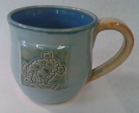 white stoneware clay green and turquoise blue inside, shino handle